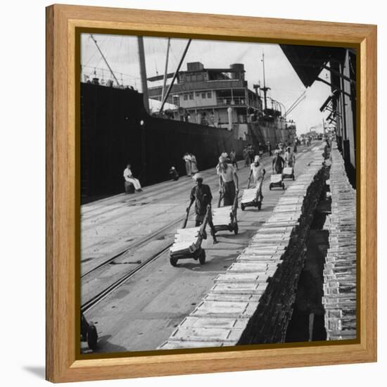 Tin Ingots Being Stacked Along the Penang Docks-Carl Mydans-Framed Premier Image Canvas