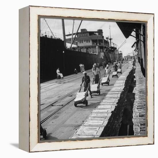 Tin Ingots Being Stacked Along the Penang Docks-Carl Mydans-Framed Premier Image Canvas