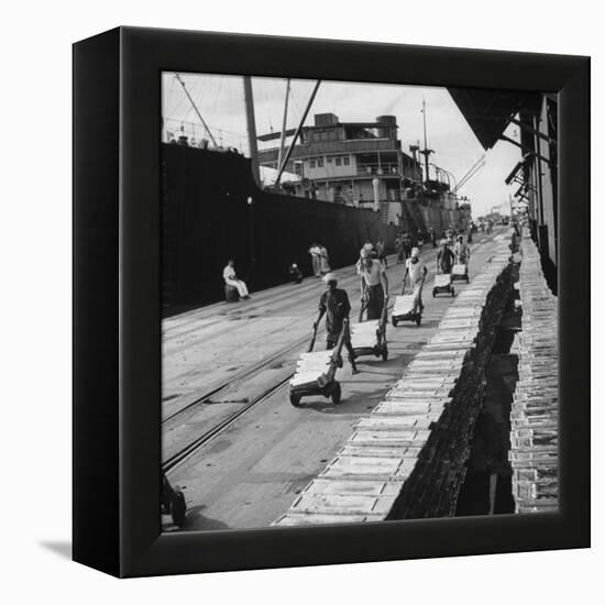 Tin Ingots Being Stacked Along the Penang Docks-Carl Mydans-Framed Premier Image Canvas