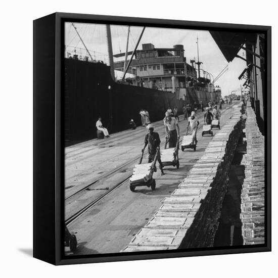 Tin Ingots Being Stacked Along the Penang Docks-Carl Mydans-Framed Premier Image Canvas