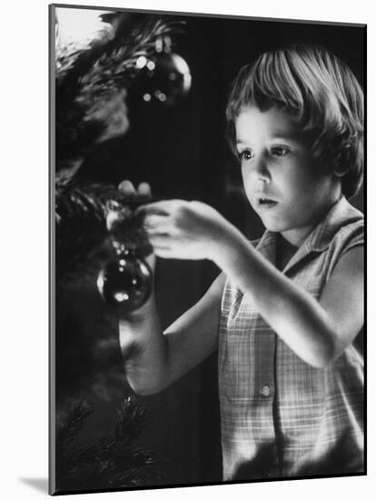 Tina Smith Decorating a Christmas Tree at Guantanamo Naval Base Where Her Dad Is Stationed-John Dominis-Mounted Photographic Print