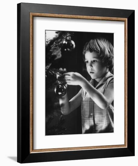 Tina Smith Decorating a Christmas Tree at Guantanamo Naval Base Where Her Dad Is Stationed-John Dominis-Framed Photographic Print