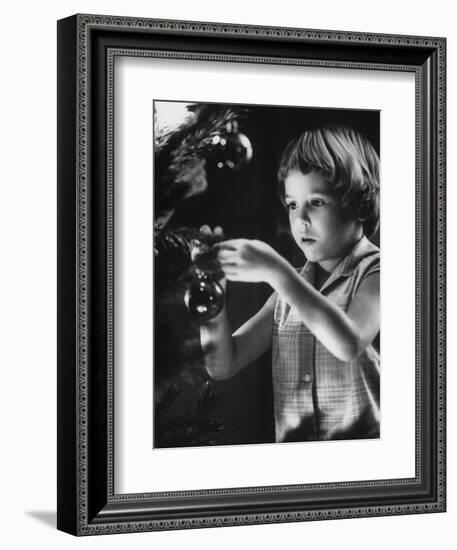 Tina Smith Decorating a Christmas Tree at Guantanamo Naval Base Where Her Dad Is Stationed-John Dominis-Framed Photographic Print