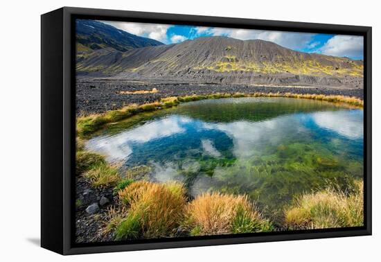 Tiny pond created by violent volcanic forces: eruption of the Eyjafjallajokull volcano, Iceland.-Betty Sederquist-Framed Premier Image Canvas