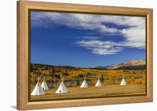 Tipis with Yellow Mountain, St. Mary, Montana, USA-Chuck Haney-Framed Premier Image Canvas