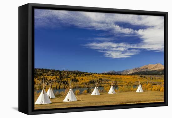 Tipis with Yellow Mountain, St. Mary, Montana, USA-Chuck Haney-Framed Premier Image Canvas