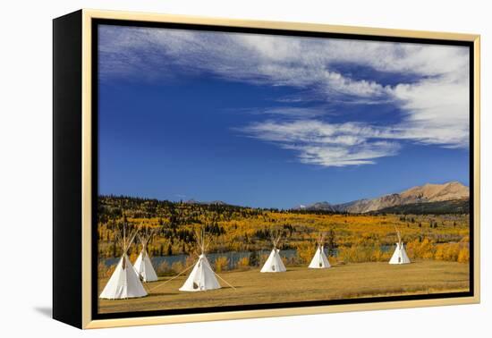 Tipis with Yellow Mountain, St. Mary, Montana, USA-Chuck Haney-Framed Premier Image Canvas