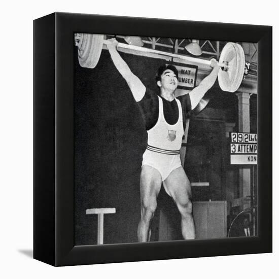 Tommy Kono Winning the Gold Medal for Men's Weightlifting at the 1956 Melbourne Olympics-null-Framed Premier Image Canvas