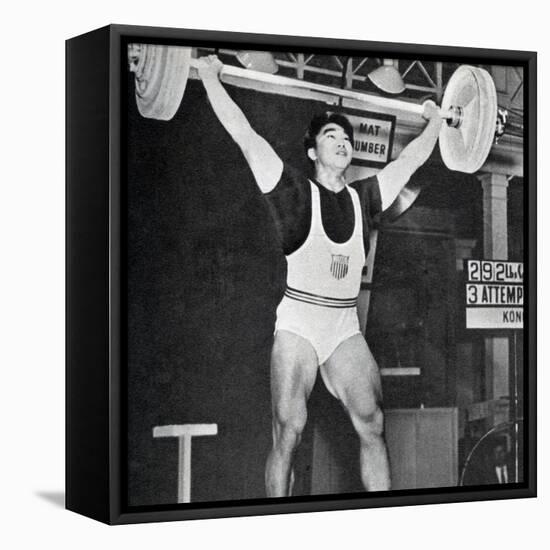 Tommy Kono Winning the Gold Medal for Men's Weightlifting at the 1956 Melbourne Olympics-null-Framed Premier Image Canvas