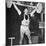 Tommy Kono Winning the Gold Medal for Men's Weightlifting at the 1956 Melbourne Olympics-null-Mounted Photographic Print