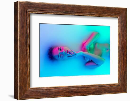 Top View of Female Face, Young Girl in the Milk Bath with Soft Glowing in Blue-Pink Neon Light. Bea-master1305-Framed Photographic Print