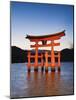 Torii Gate at the Itsukushima Jinga Shrine-Rudy Sulgan-Mounted Photographic Print