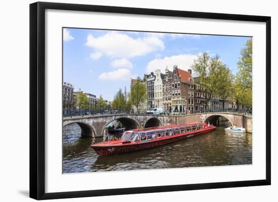 Tourist Boat Crossing Keizersgracht Canal, Amsterdam, Netherlands, Europe-Amanda Hall-Framed Photographic Print