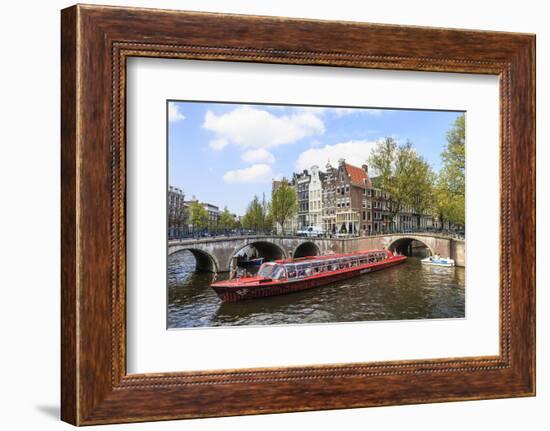 Tourist Boat Crossing Keizersgracht Canal, Amsterdam, Netherlands, Europe-Amanda Hall-Framed Photographic Print