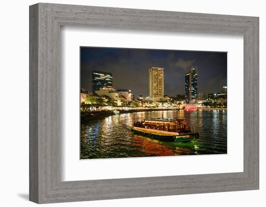 Tourist boat near the historic Boat Quay in Singapore river at dusk, Singapore-Martin Child-Framed Photographic Print