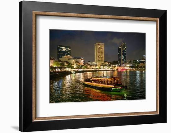 Tourist boat near the historic Boat Quay in Singapore river at dusk, Singapore-Martin Child-Framed Photographic Print