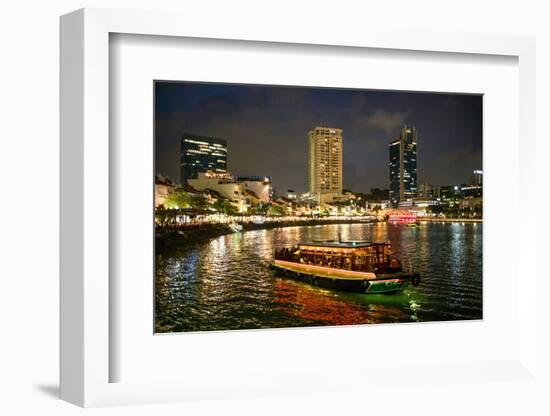 Tourist boat near the historic Boat Quay in Singapore river at dusk, Singapore-Martin Child-Framed Photographic Print