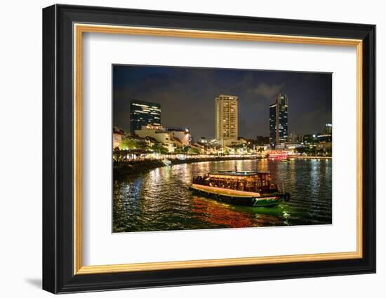 Tourist boat near the historic Boat Quay in Singapore river at dusk, Singapore-Martin Child-Framed Photographic Print