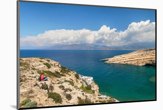 Tourist enjoying the view of the bay of Matala, Iraklion, Crete, Greek Islands, Greece, Europe-Markus Lange-Mounted Photographic Print