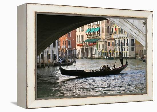 Tourist in a Gondola as They Pass under the Rialto Bridge, Venice, Italy-David Noyes-Framed Premier Image Canvas