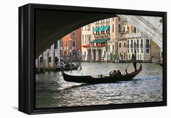 Tourist in a Gondola as They Pass under the Rialto Bridge, Venice, Italy-David Noyes-Framed Premier Image Canvas