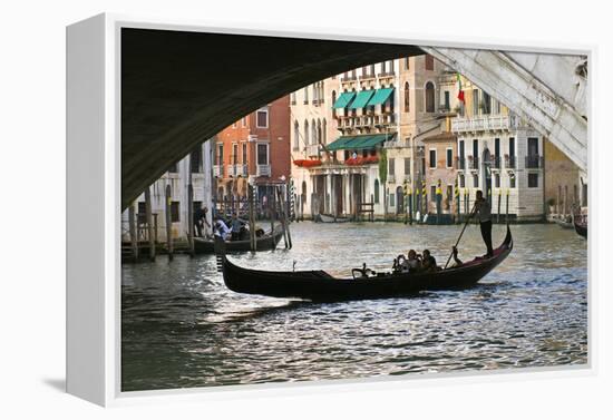 Tourist in a Gondola as They Pass under the Rialto Bridge, Venice, Italy-David Noyes-Framed Premier Image Canvas