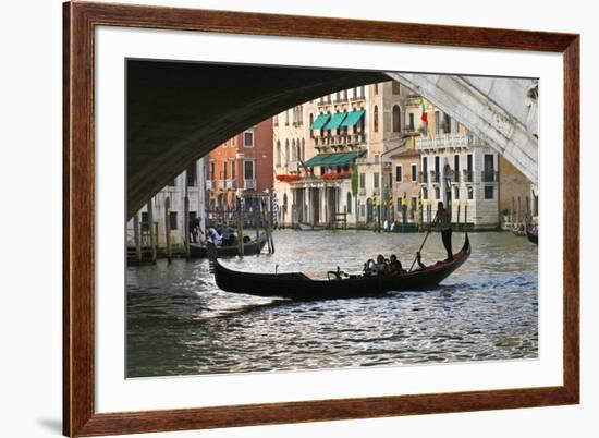 Tourist in a Gondola as They Pass under the Rialto Bridge, Venice, Italy-David Noyes-Framed Premium Photographic Print