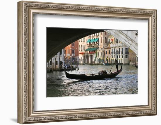 Tourist in a Gondola as They Pass under the Rialto Bridge, Venice, Italy-David Noyes-Framed Photographic Print