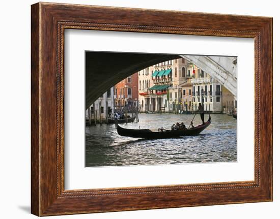 Tourist in a Gondola as They Pass under the Rialto Bridge, Venice, Italy-David Noyes-Framed Photographic Print