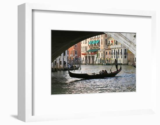 Tourist in a Gondola as They Pass under the Rialto Bridge, Venice, Italy-David Noyes-Framed Photographic Print