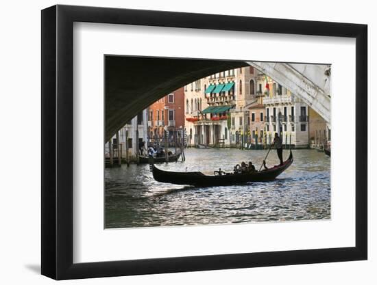 Tourist in a Gondola as They Pass under the Rialto Bridge, Venice, Italy-David Noyes-Framed Photographic Print