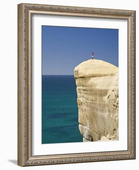 Tourist on Cliff Top at Tunnel Beach, Dunedin, South Island, New Zealand-David Wall-Framed Photographic Print