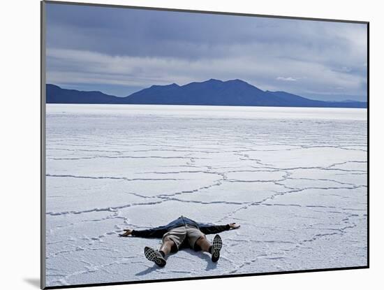 Tourist on Salt Crust of Salar De Uyuni, Emphasising Scale of Largest Salt Flat in World, Bolivia-John Warburton-lee-Mounted Photographic Print