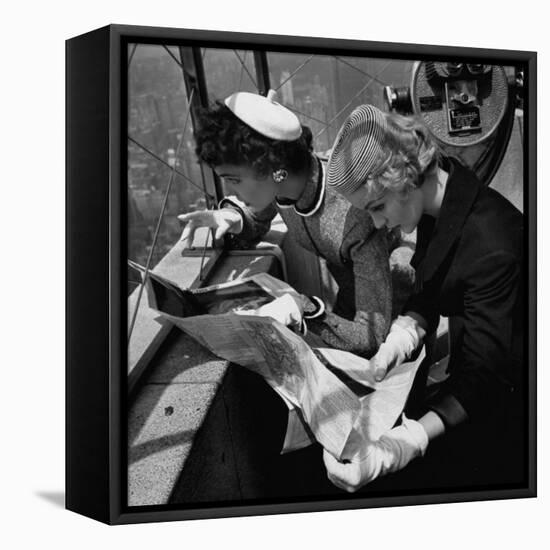 Tourist Viewing Nyc from Observation Roof of Empire State Bldg-Nina Leen-Framed Premier Image Canvas