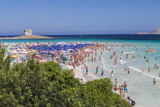 Tourists And Beach Umbrellas At La Pelosa Beach Stintino Asinara Natl Park Sardinia Italy Photographic Print By Roberto Moiola Artcom