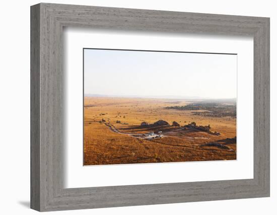 Tourists at Fenetre d'Isalo (the window of Isalo), Isalo National Park, central area, Madagascar, A-Christian Kober-Framed Photographic Print