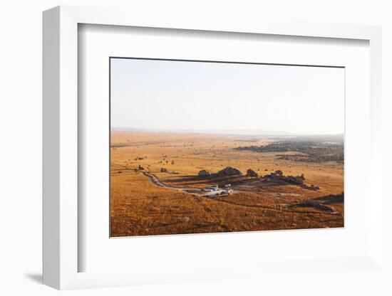 Tourists at Fenetre d'Isalo (the window of Isalo), Isalo National Park, central area, Madagascar, A-Christian Kober-Framed Photographic Print