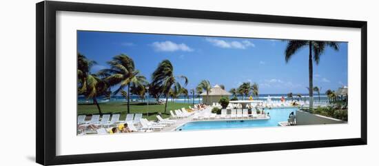 Tourists at Poolside in a Seaside Resort, Montego Bay, St. James Parish, Jamaica-null-Framed Photographic Print