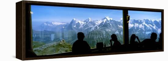 Tourists at Schilthorn 007 Restaurant with Mt Eiger Mt Monch Mt Jungfrau in the Background-null-Framed Stretched Canvas