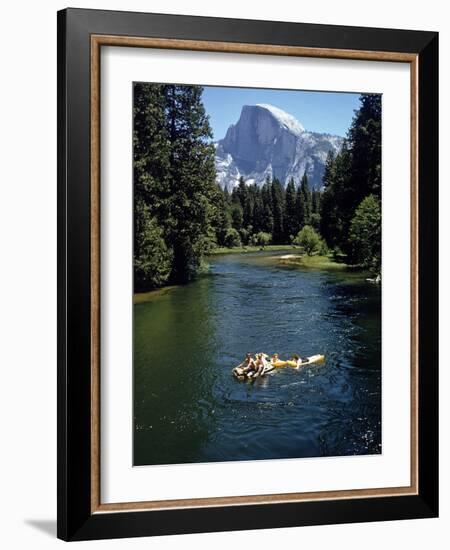 Tourists Float on a Raft in the Merced River at Yosemite National Park-Ralph Crane-Framed Photographic Print