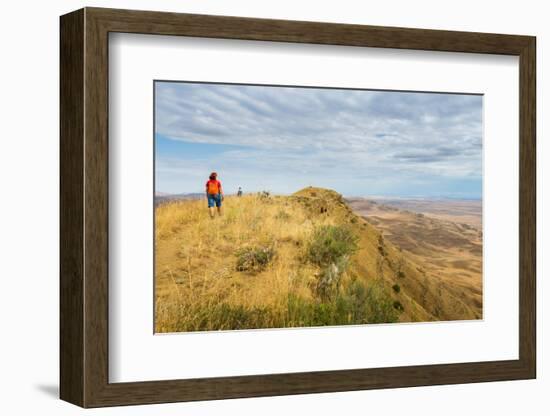 Tourists hiking along the border between Georgia and Azerbaijan near David Gareji Monastery, Udabno-Jan Miracky-Framed Photographic Print