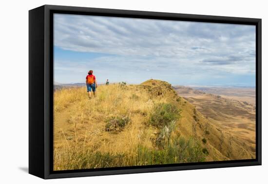 Tourists hiking along the border between Georgia and Azerbaijan near David Gareji Monastery, Udabno-Jan Miracky-Framed Premier Image Canvas