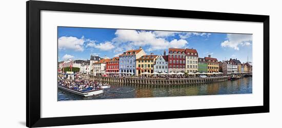 Tourists in a Tourboat with Buildings Along a Canal, Nyhavn, Copenhagen, Denmark-null-Framed Photographic Print