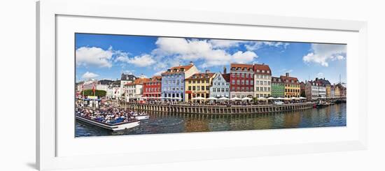 Tourists in a Tourboat with Buildings Along a Canal, Nyhavn, Copenhagen, Denmark-null-Framed Photographic Print