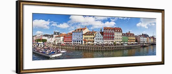 Tourists in a Tourboat with Buildings Along a Canal, Nyhavn, Copenhagen, Denmark-null-Framed Photographic Print