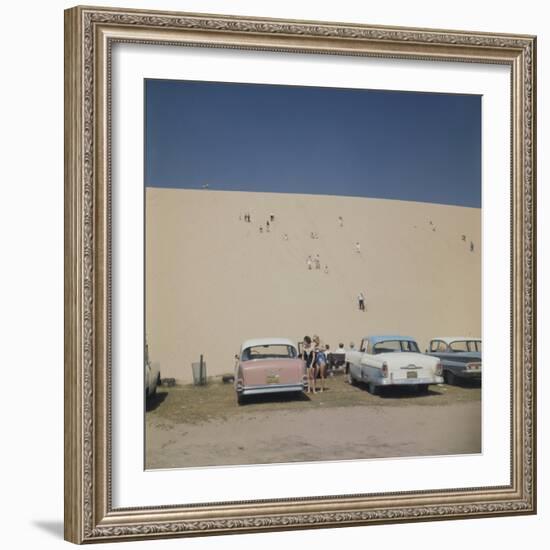 Tourists in Bathing Suits by Parked Cars and Climbing the Sleeping Bear Sand Dunes, Michigan, 1961-Frank Scherschel-Framed Photographic Print