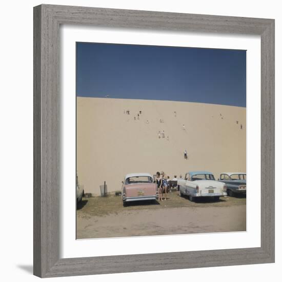 Tourists in Bathing Suits by Parked Cars and Climbing the Sleeping Bear Sand Dunes, Michigan, 1961-Frank Scherschel-Framed Photographic Print