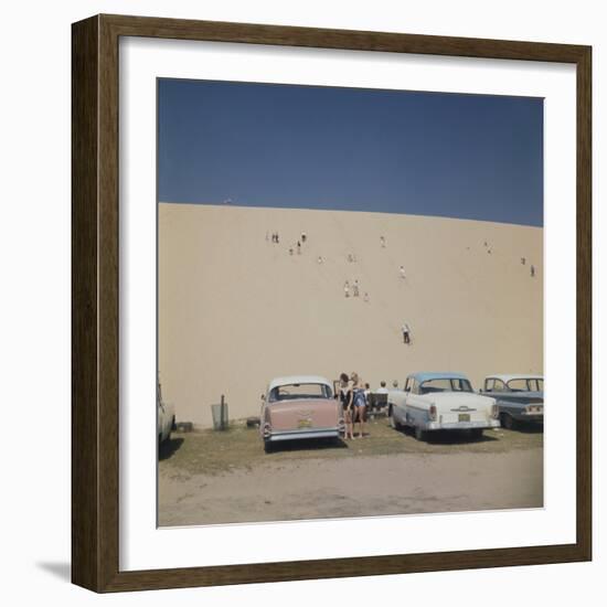 Tourists in Bathing Suits by Parked Cars and Climbing the Sleeping Bear Sand Dunes, Michigan, 1961-Frank Scherschel-Framed Photographic Print