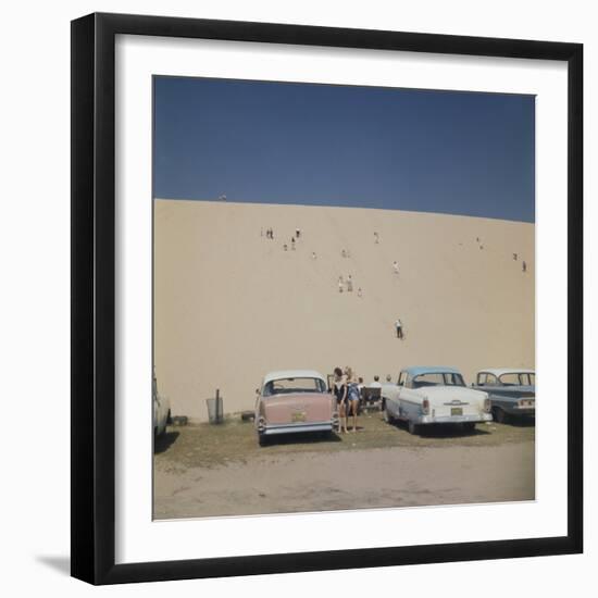 Tourists in Bathing Suits by Parked Cars and Climbing the Sleeping Bear Sand Dunes, Michigan, 1961-Frank Scherschel-Framed Photographic Print