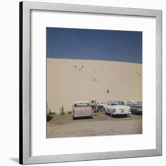 Tourists in Bathing Suits by Parked Cars and Climbing the Sleeping Bear Sand Dunes, Michigan, 1961-Frank Scherschel-Framed Photographic Print